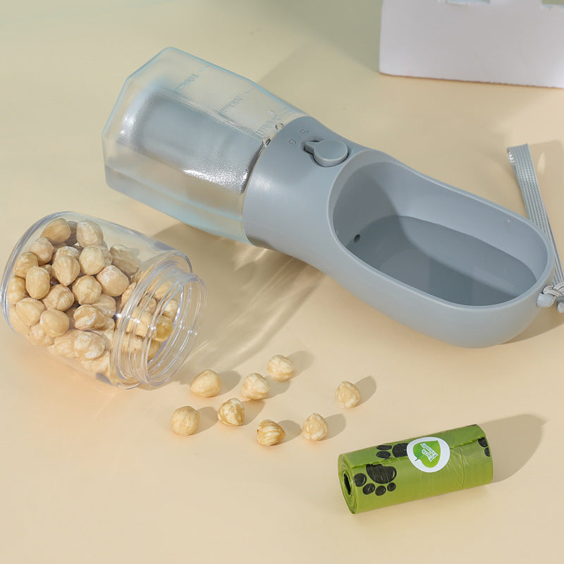 AdventurePup™ 3-in-1 Portable Travel Bottle – Water, Food & Waste Bag Dispenser